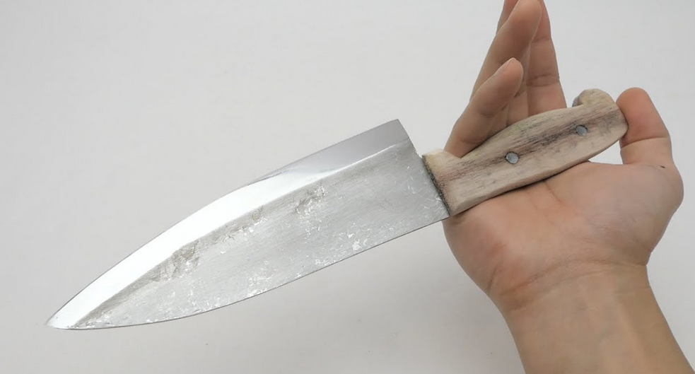 How to make a super sharp kitchen knife blade out of an entire roll of aluminum foil 1