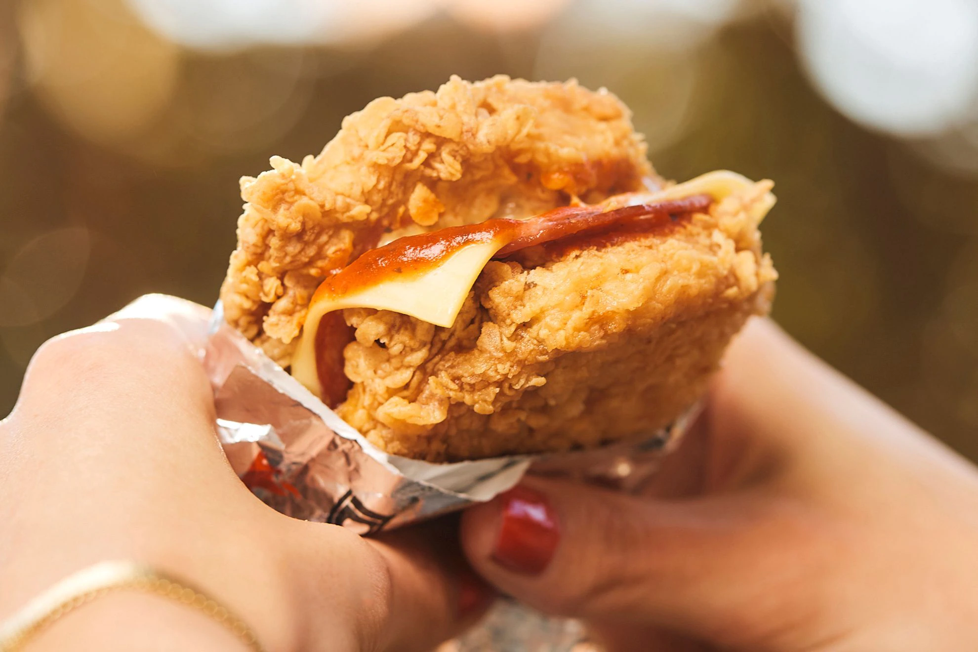 What the hell!  KFC Australia is making news by introducing the comfort-food mashup of pizza and fried chicken that will be available at KFC locations across Australia. 