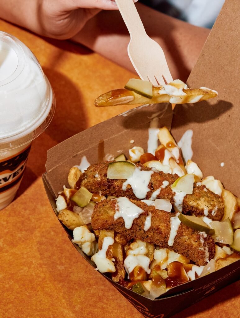 Harvey’s Triple Pickle Poutine is made with 100% Canadian cheese curds and potatoes, topped with gravy, two deep-fried pickles, and diced pickles with Garlic Dill sauce. 