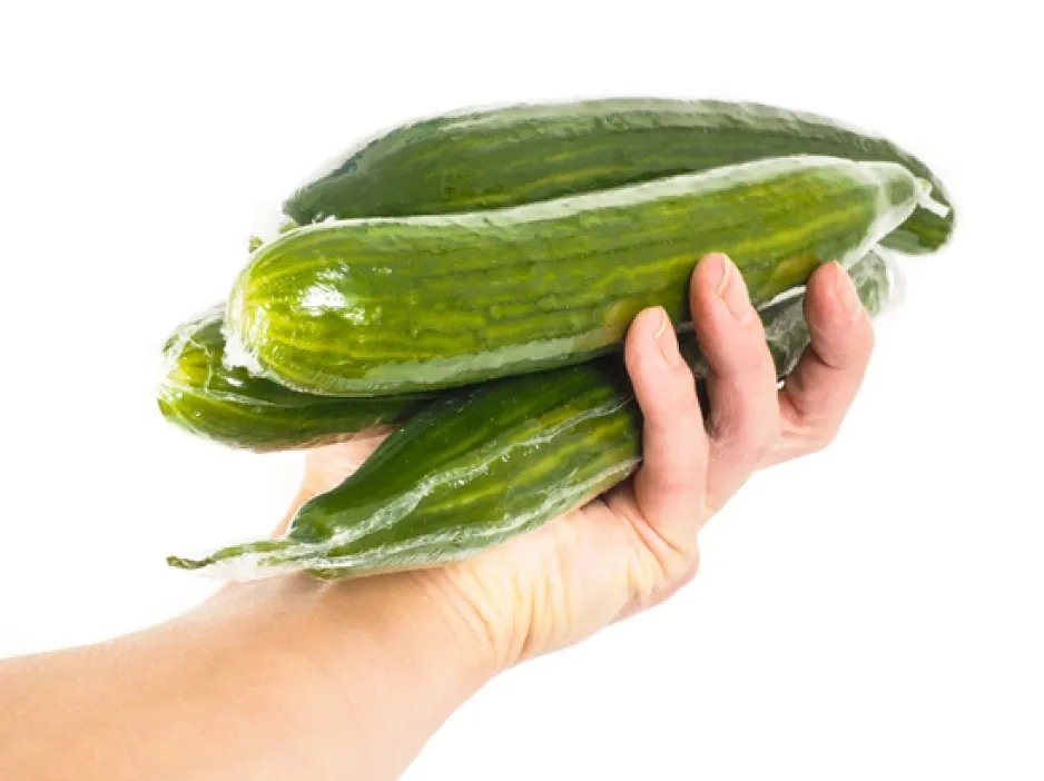 Why are English cucumbers wrapped in plastic? Discover how this protects their delicate skin, extends shelf life, and preserves freshness. Learn about cucumber varieties too!
