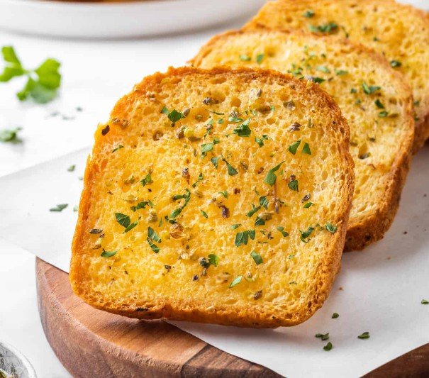 Discover the origins of Texas Toast, created in 1941 at Beaumont's Pig Stand. This thick, buttery bread became a Texas staple and an American classic.